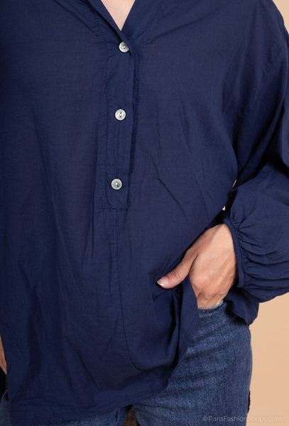 Liz-paidassa edessä kolme avattavaa nappia. Susanne