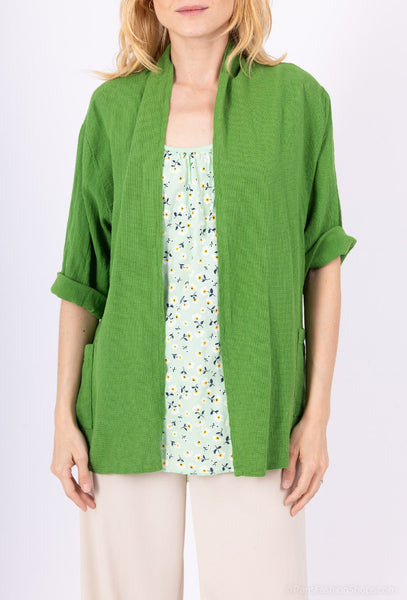 Kirkkaan vihreä Del, ohut ja rento yhden koon auki pidettävä jakku, edessä taskut. Susanne