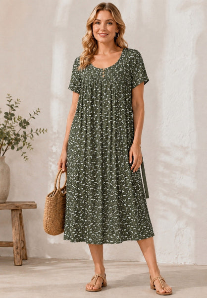 Pikkukukallinen Maiken mekko vihreänä. Susanne