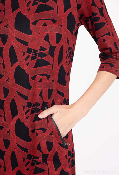 Avattavat vetoketjutaskut Brooke tunikamekossa. Susanne